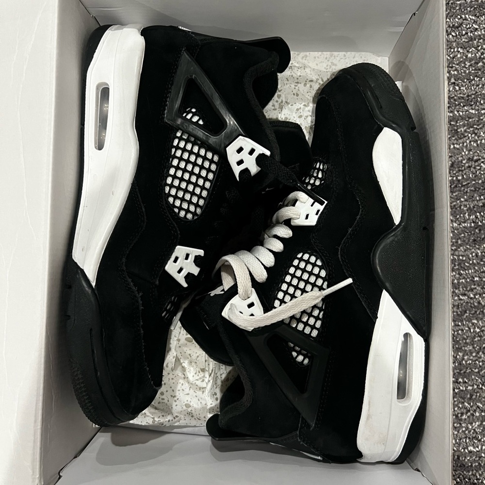 Jordan 4 Retro Black and White Sneakers